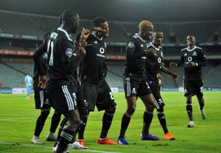 Fortune Makaringe celebrates his goal with teammates