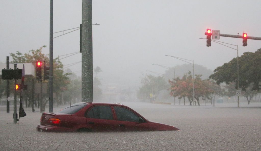 Car in Hawaii flooded by Hurricane Lane&amp;#039;s rain.