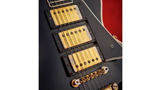 Three of Gibson’s revolutionary PAF humbucking pickups were introduced on Les Paul Customs in 1957 in order to replace the earlier standard configuration of Alnico 5 (neck) and P-90 (bridge) pickups