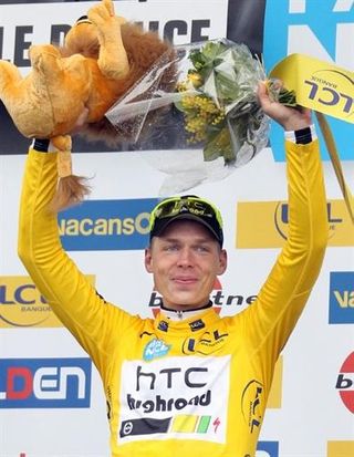 Tony Martin (HTC-Highroad) waves his Paris-Nice winner's lion