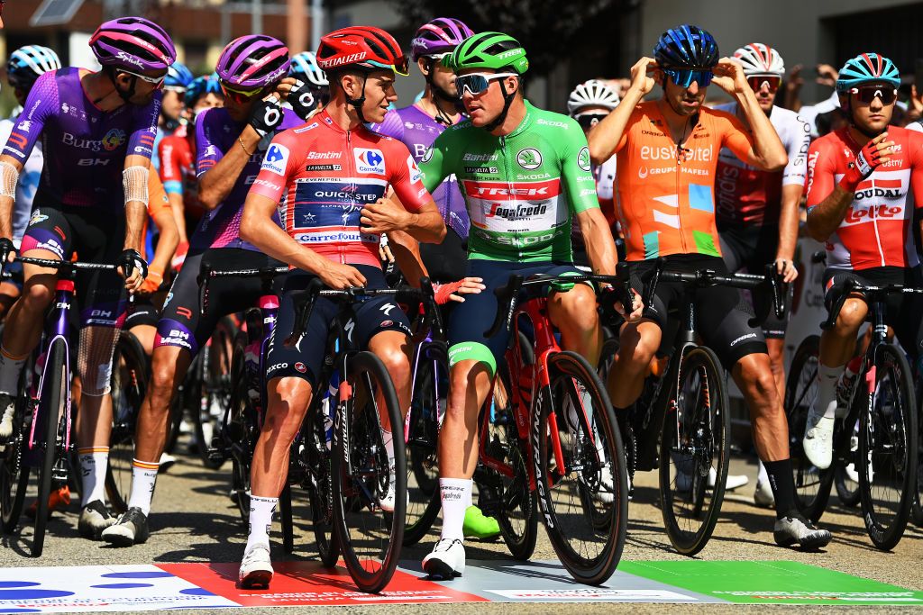 LES PRAERESNAVA SPAIN AUGUST 28 LR Remco Evenepoel of Belgium and Team QuickStep Alpha Vinyl Red Leader Jersey and Mads Pedersen of Denmark and Team Trek Segafredo Green Points Jersey prior to the 77th Tour of Spain 2022 Stage 9 a 1714km stage from Villaviciosa to Les Praeres Nava 743m LaVuelta22 WorldTour on August 28 2022 in Les Praeres Nava Spain Photo by Tim de WaeleGetty Images