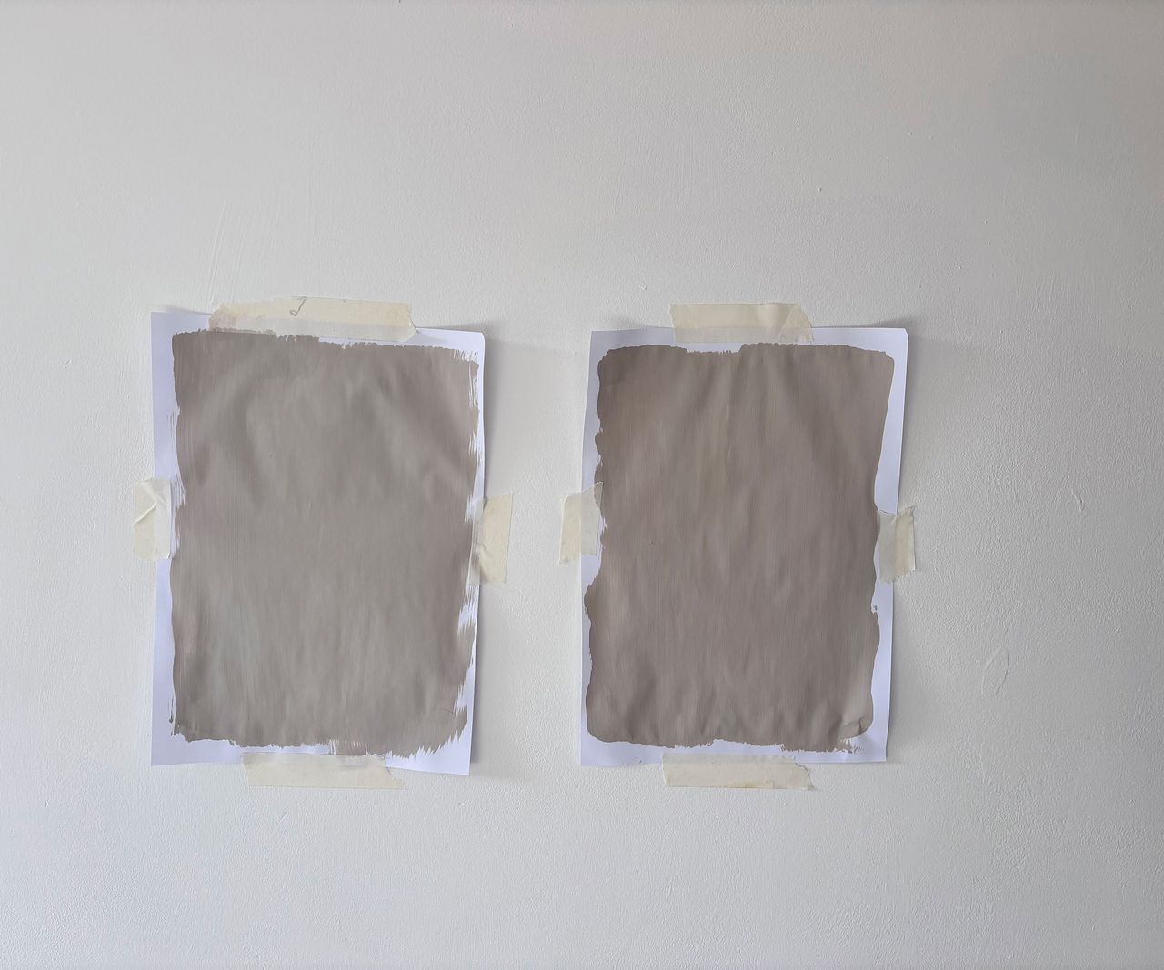 two paint samples on a wall