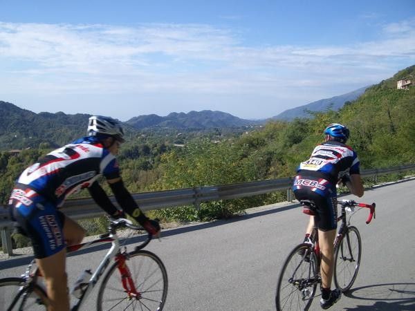 Two team riders descend