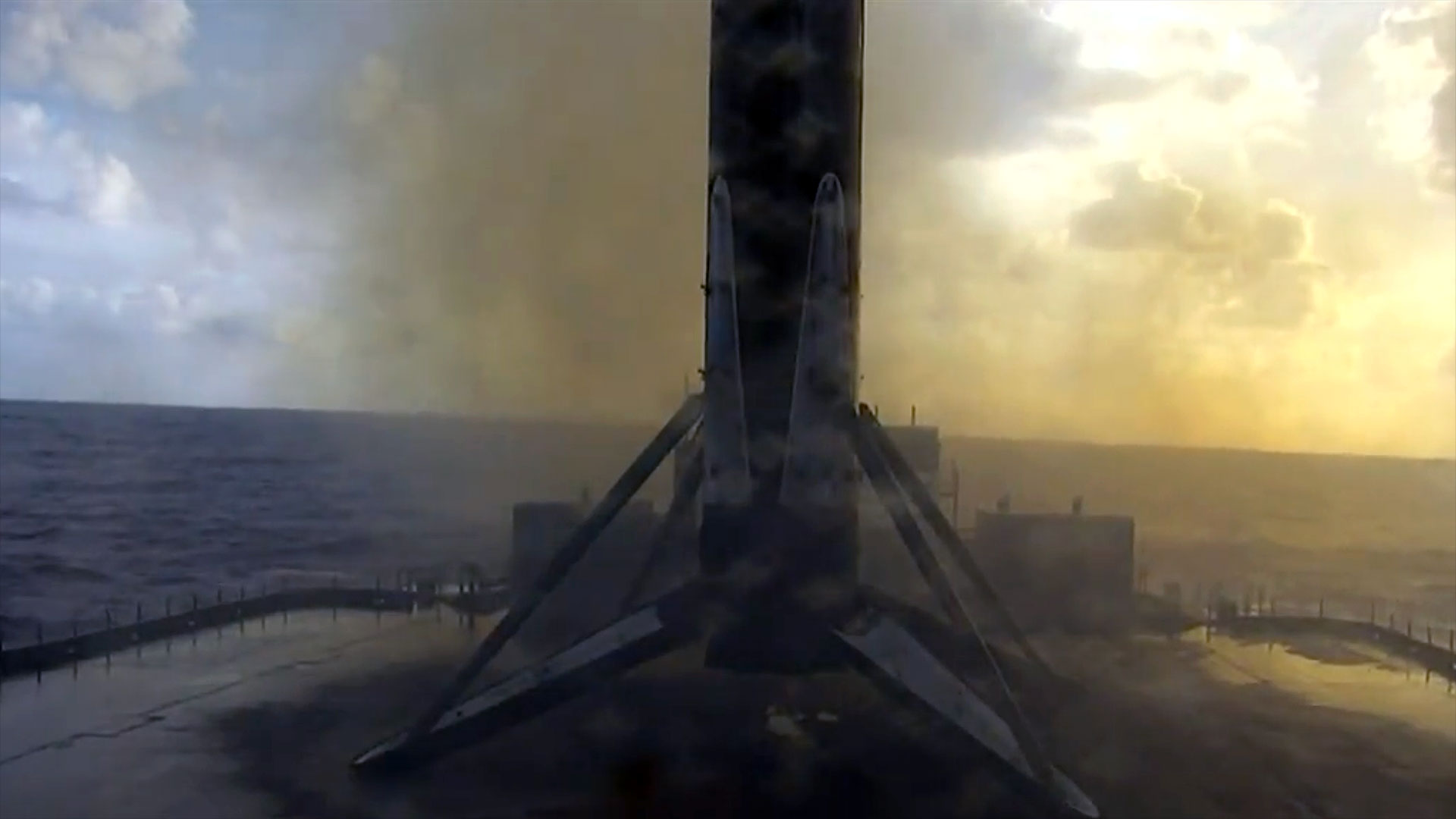 The first stage of a SpaceX Falcon 9 rocket is seen after landing on the droneship 