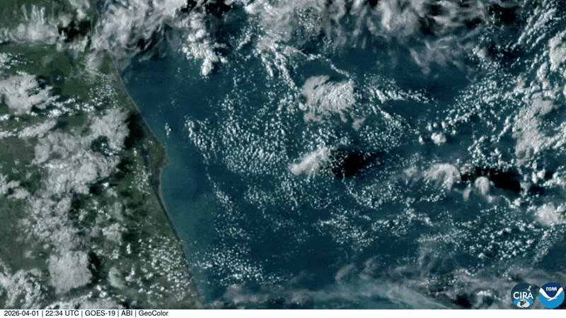 satellite aerial view of the Florida coast and a long white plume stretching along the atmosphere showing Artemis 2 launch.