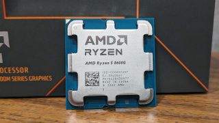 AMD Ryzen 5 8600G leaning against its box