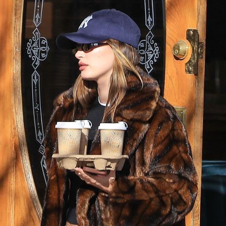 Hailey Bieber wearing a brown fur coat in Aspen