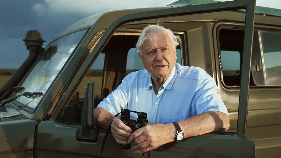 David Attenborough in a car