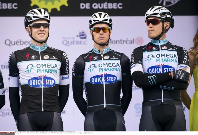 Matteo Trentin (far right) looking distracted as Omega Pharma-Quick Step are presented to the crowd