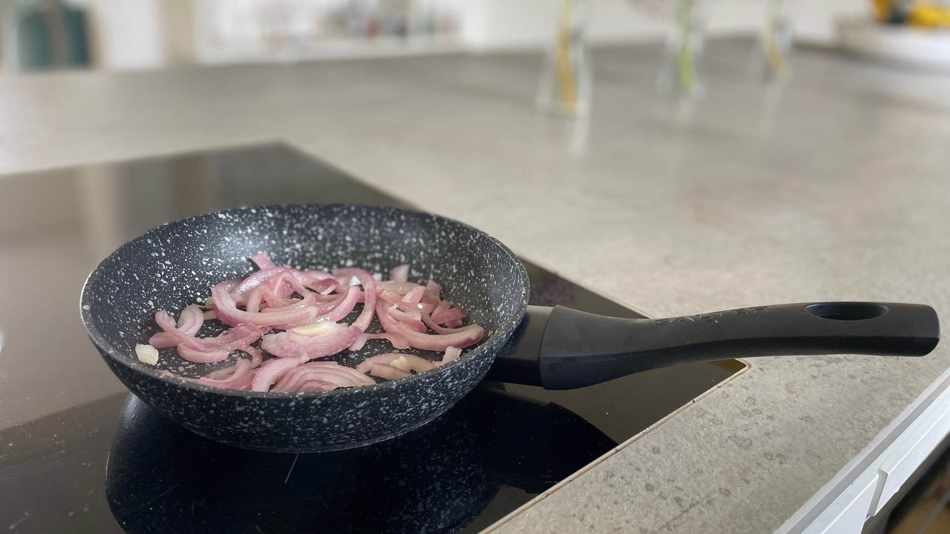 Frying onions in the Salter Megastone Frying Pan Set
