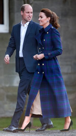 Prince William and Catherine, Princess of Wales walk as they host a drive-in cinema screening of Disney's 'Cruella' for Scottish NHS workers at The Palace of Holyroodhouse on May 26, 2021