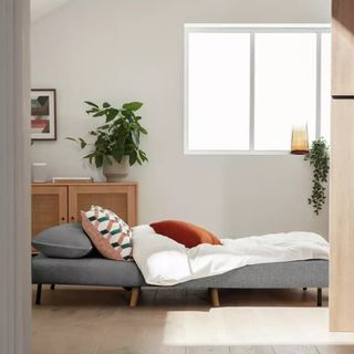 The Roma sofa bed from Habitat extended in a small living room