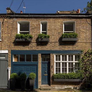 Exterior view of Farnell Mews showing facebrick and dark blue door
