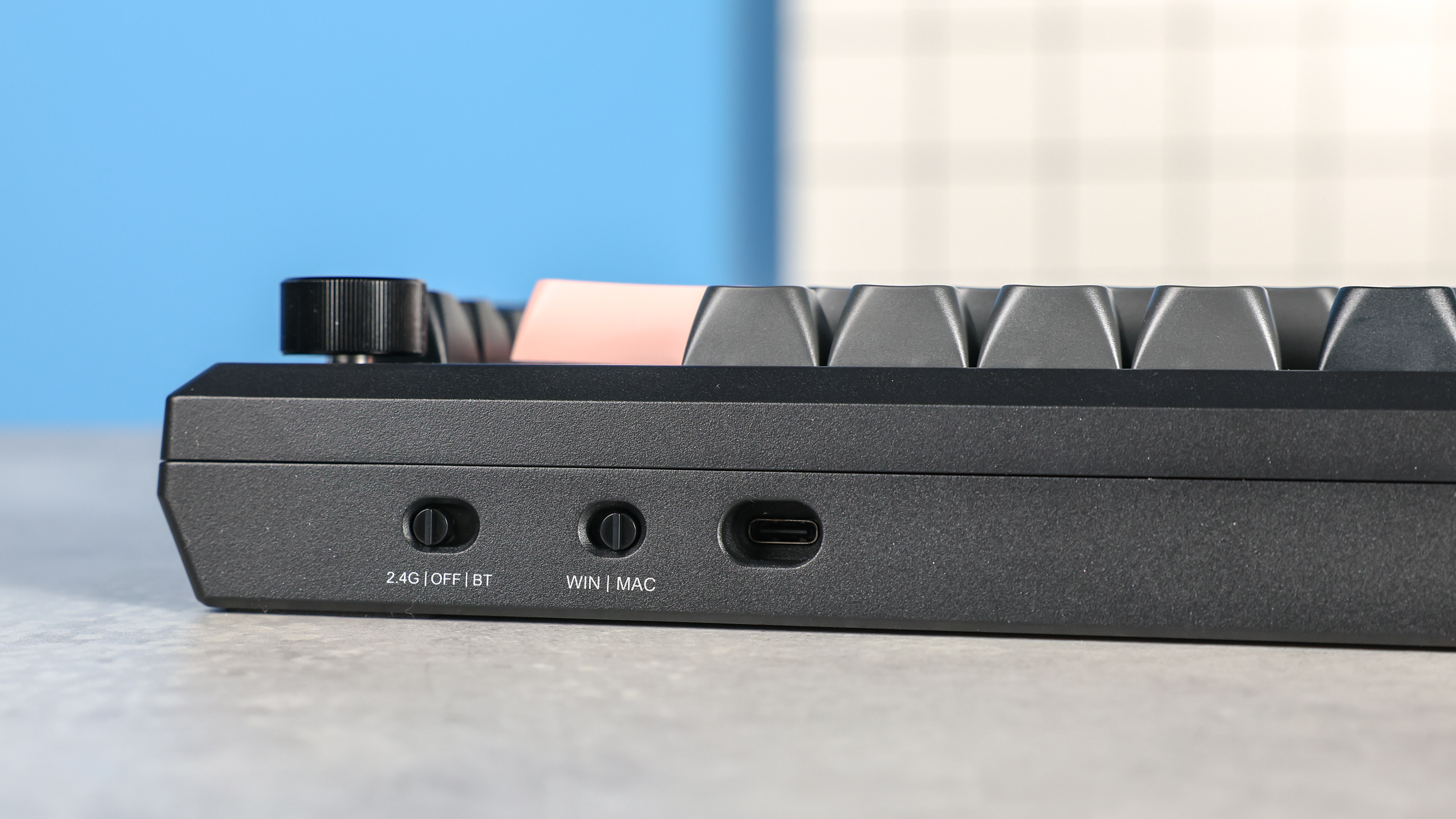 Redragon Eclipse K720 Pro photographed in front of a blue background.