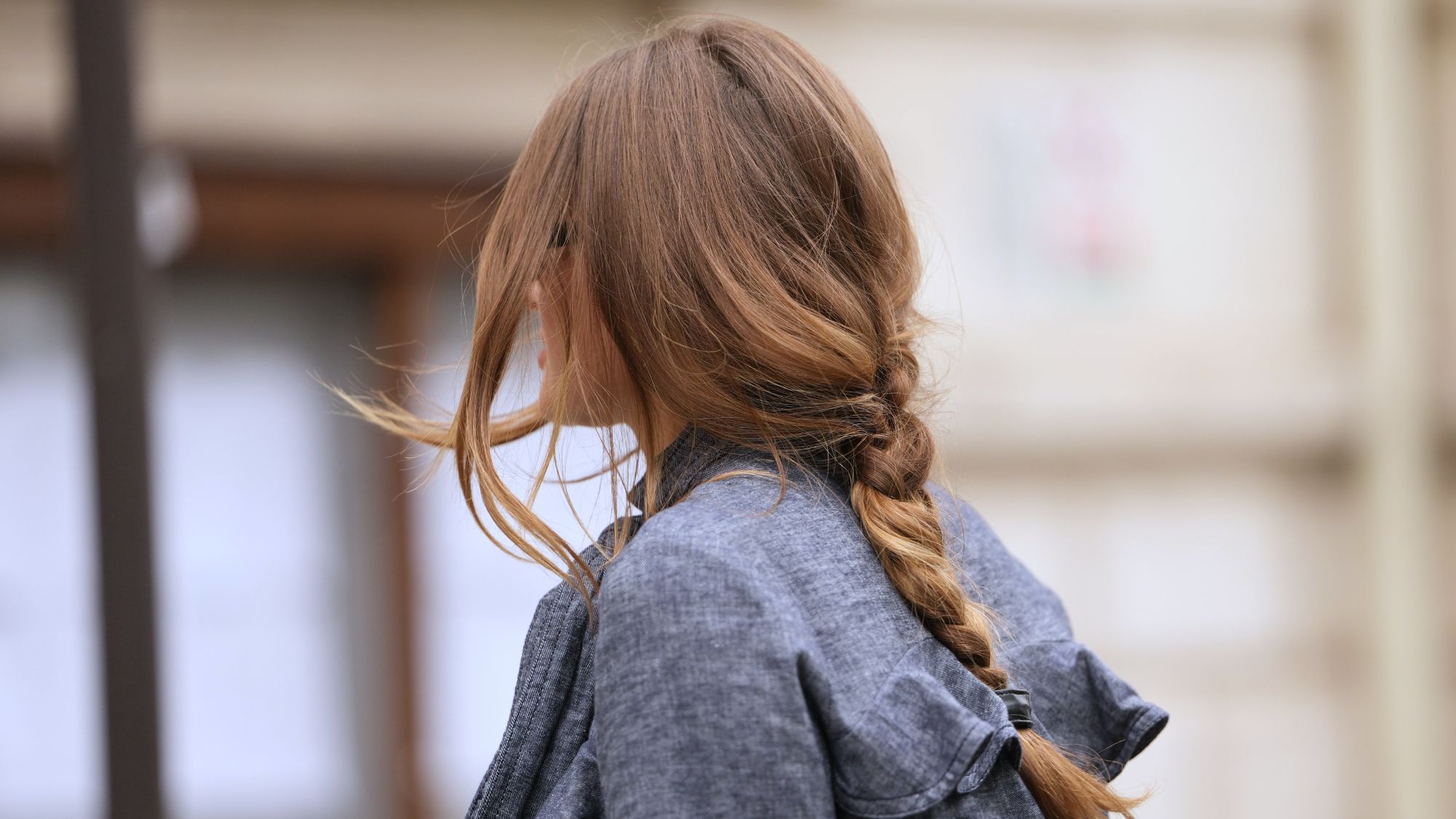 street style shot of woman with plaited hair