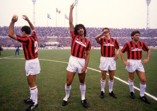 Ruud Gullit and team-mates wave to AC Milan fans in the 1989/90 season.