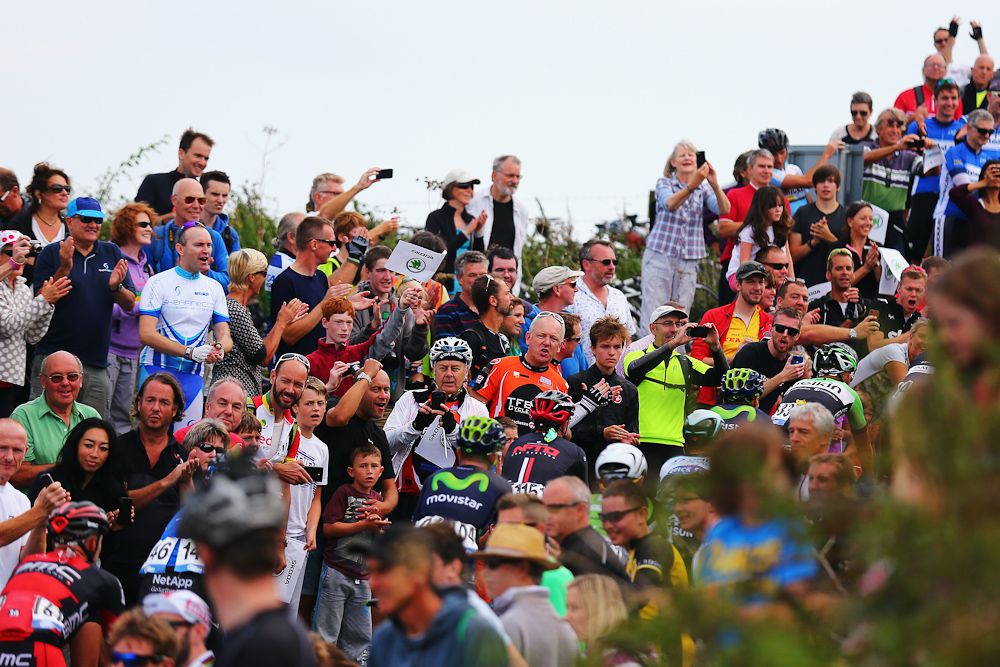 Fans cheer the riders up Ditchling Beacon during stage seven of the 2014 Tour of Britain from Camberely to Brighton.