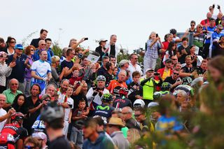 Fans cheer the riders up Ditchling Beacon during stage seven of the 2014 Tour of Britain from Camberely to Brighton.