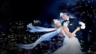 A blindfolded couple dancing, in front of a background with skyscrapers in Married at First Sight art