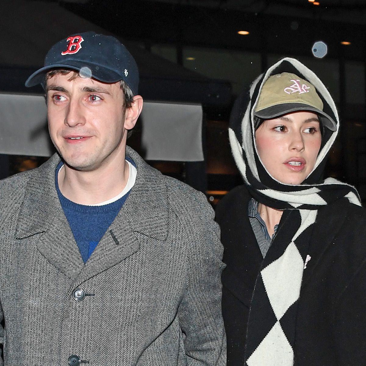 Paul Mescal and Gracie Abrams wearing coats and jeans in London