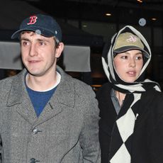 Paul Mescal and Gracie Abrams wearing coats and jeans in London