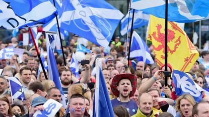 Pro-independence supporters march through Glasgow.
