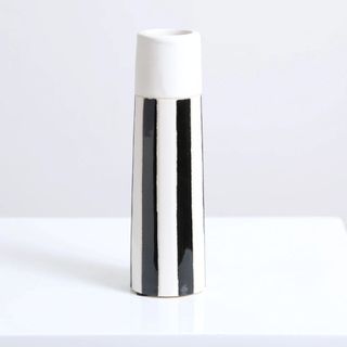 Tall black and white striped vase