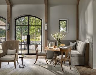 banquette seating in neutral living room by Jessica Lagrange