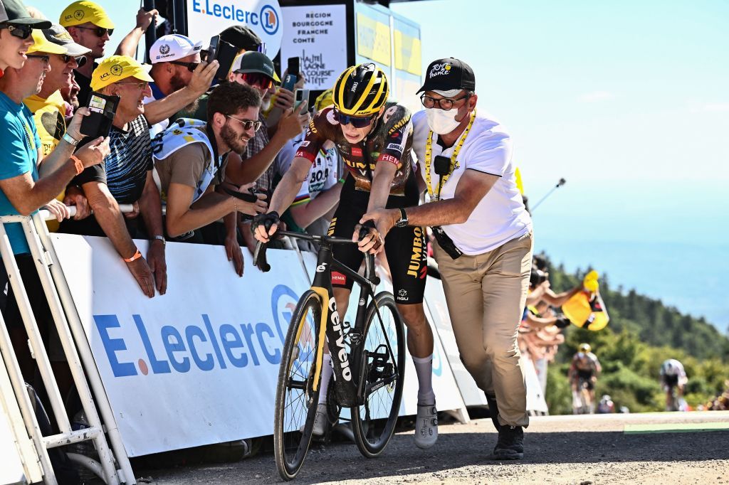 JumboVisma teams Danish rider Jonas Vingegaard is assisted after crossing the finish line of the 7th stage of the 109th edition of the Tour de France cycling race 1763 km between Tomblaine and La Super Planche des Belles Filles in eastern France on July 8 2022 Photo by Marco BERTORELLO AFP Photo by MARCO BERTORELLOAFP via Getty Images