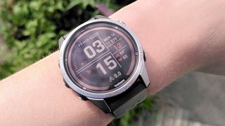 Garmin Fenix 7 Pro GPS watch on woman's wrist