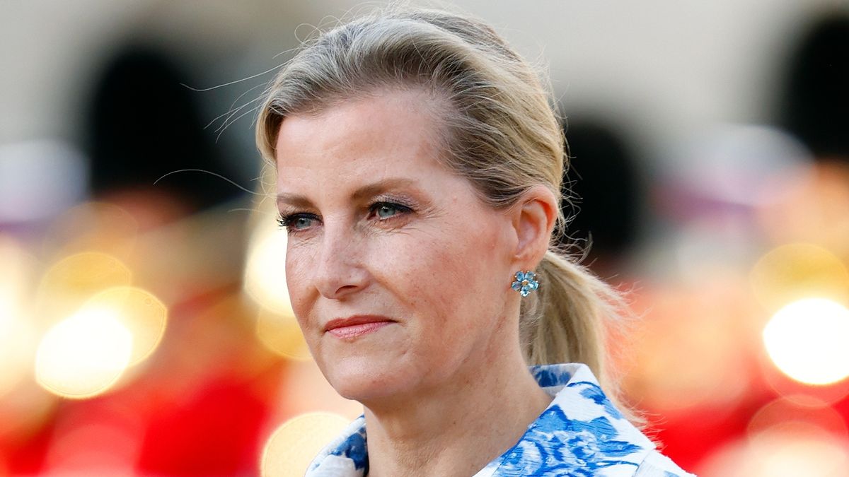 duchess sophie wows in summery blue dress and espadrille wedges Dusty Blue Embroidered Flower V Neck Mini Dress main image 1