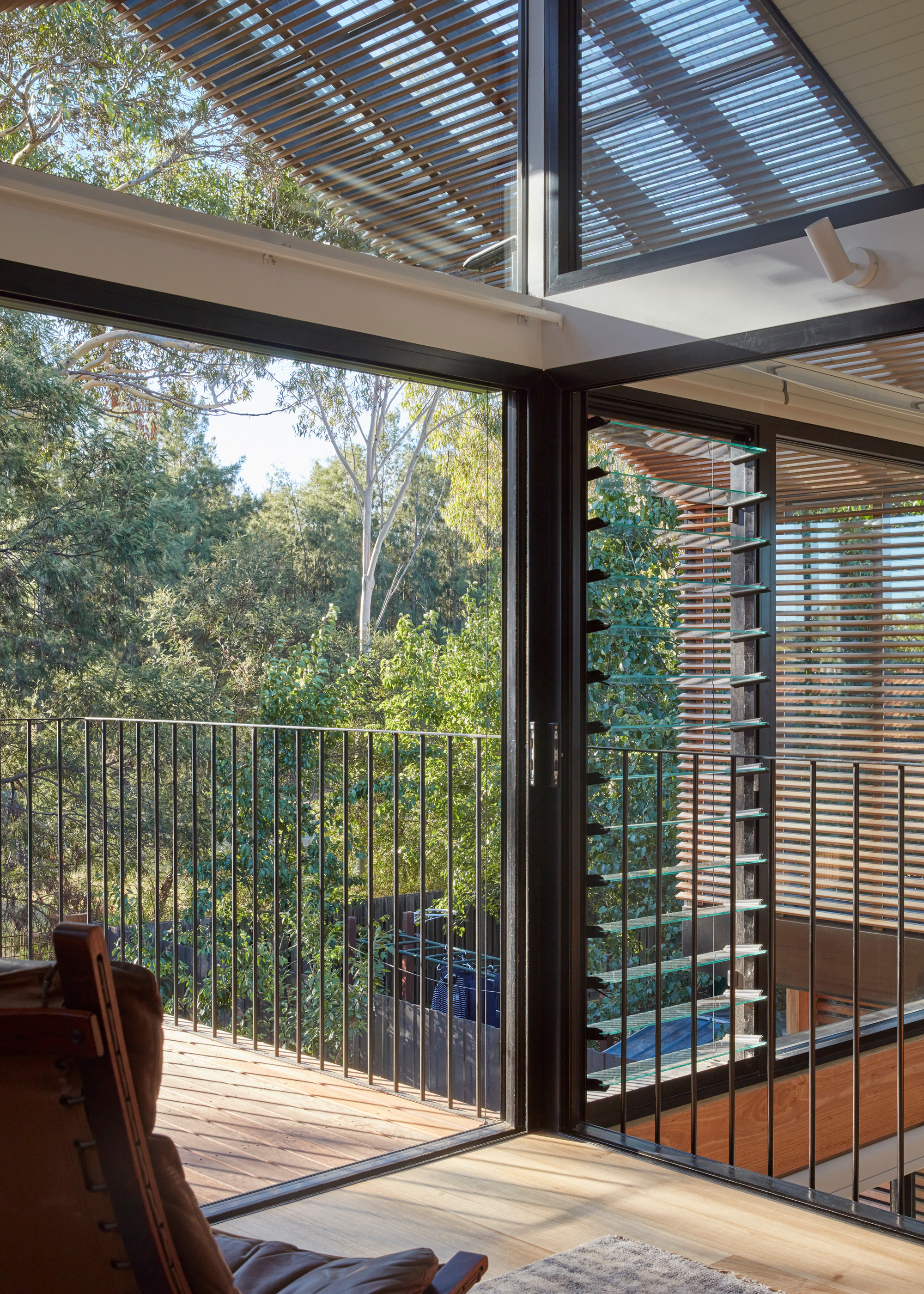 slatted gable roof over a first floor balcony