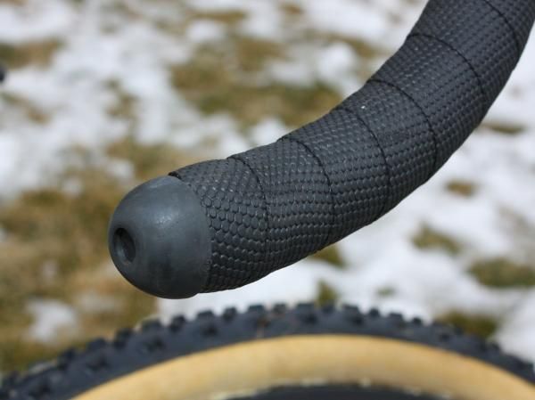 The grippy bar tape is finished off with Edge Composites' own bullet-shaped caps.