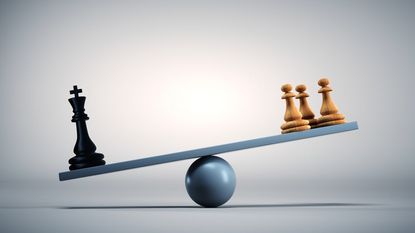 An uneven scale with one king chess piece having more weight than three pawns 