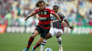 David Luiz of Flamengo competes for the ball with Jhon Arias of Fluminense during a match between Fluminense and Flamengo as part of Brasileirao 2023 at Maracana Stadium on July 16, 2023