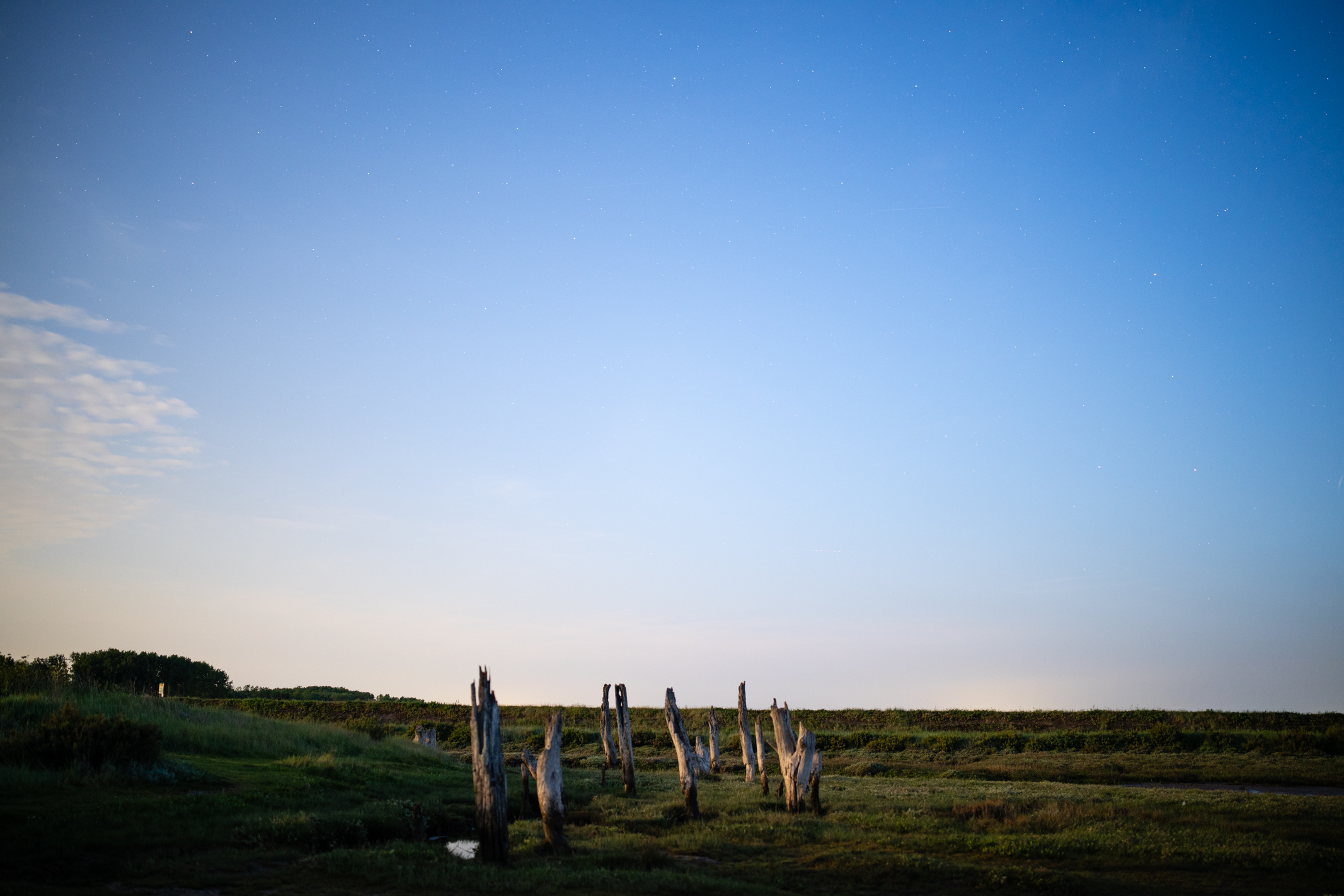 Photo of wooden posts taken with the Viltrox AF 35mm f/1.2 LAB FE under the June 2025 strawberry moon