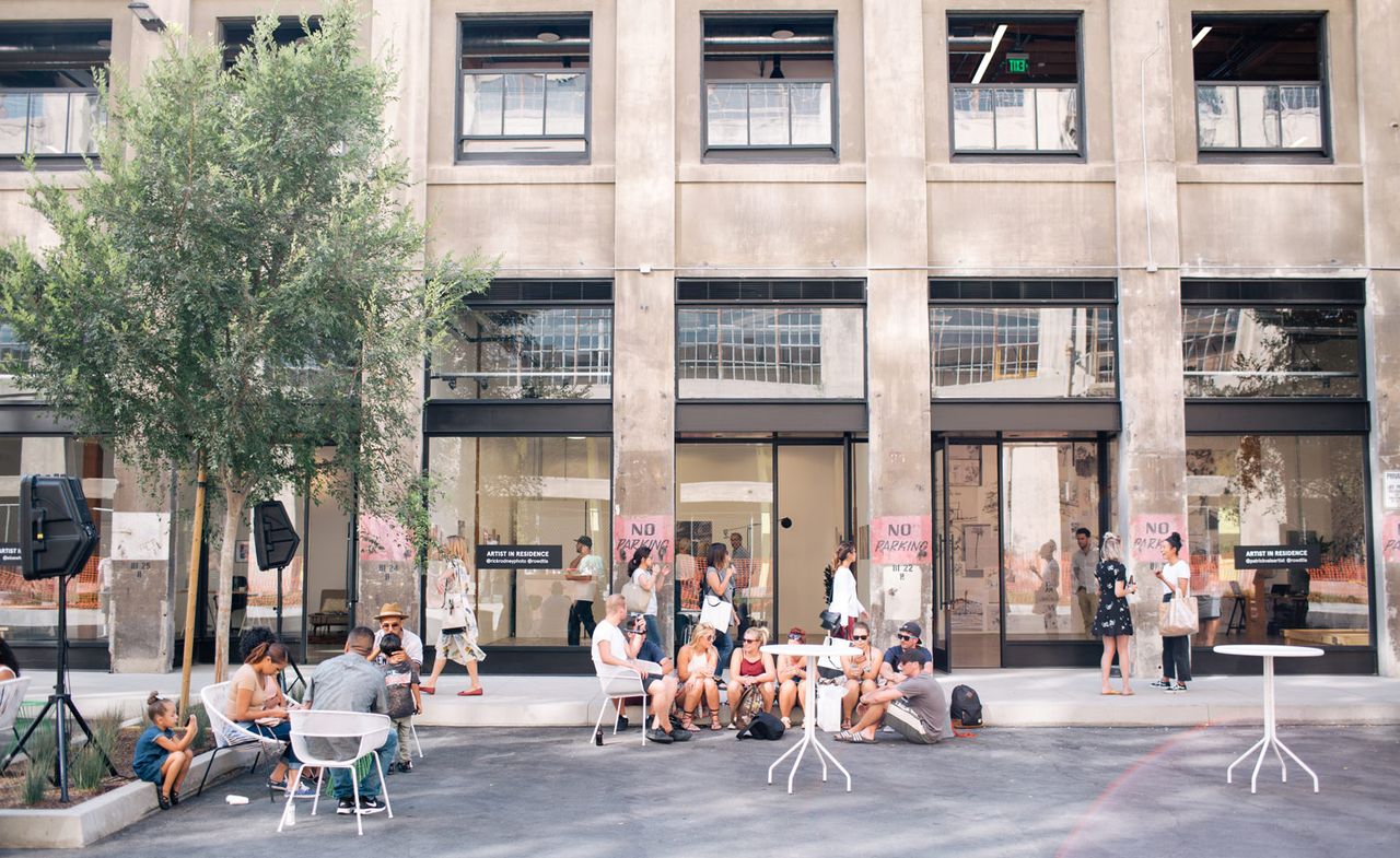 People on street outside building