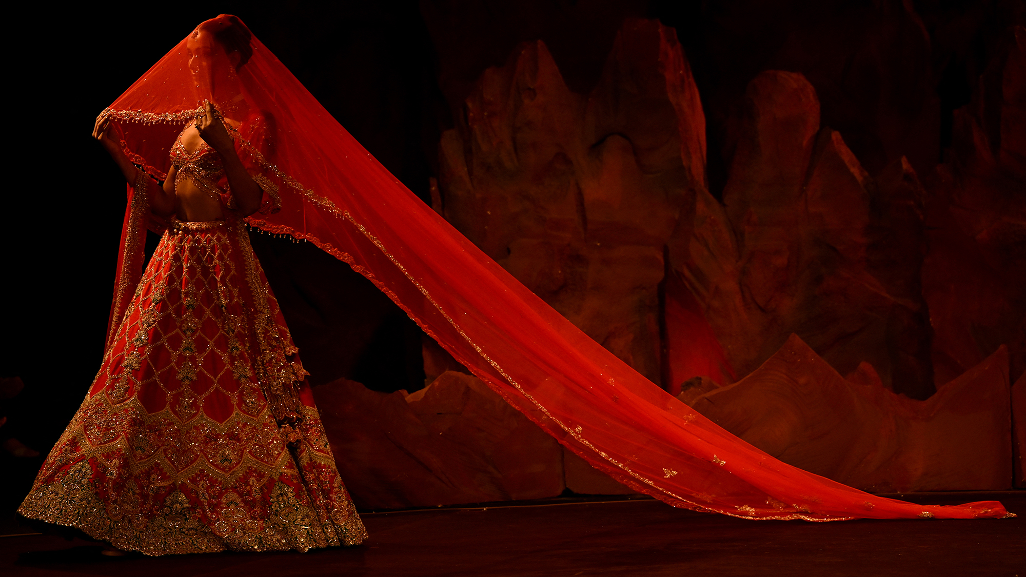 A model walks the runway wearing a creation by designer Dolly J during Hyundai India Couture Week in New Delhi, India