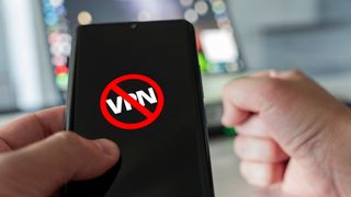 Logo on a mobile screen showing VPN ban