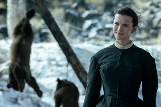 betty gilpin as sara wearing an 1800s dress in a snowy landscape in american primeval