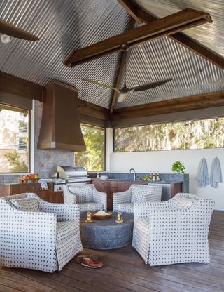 outdoor kitchen with living area