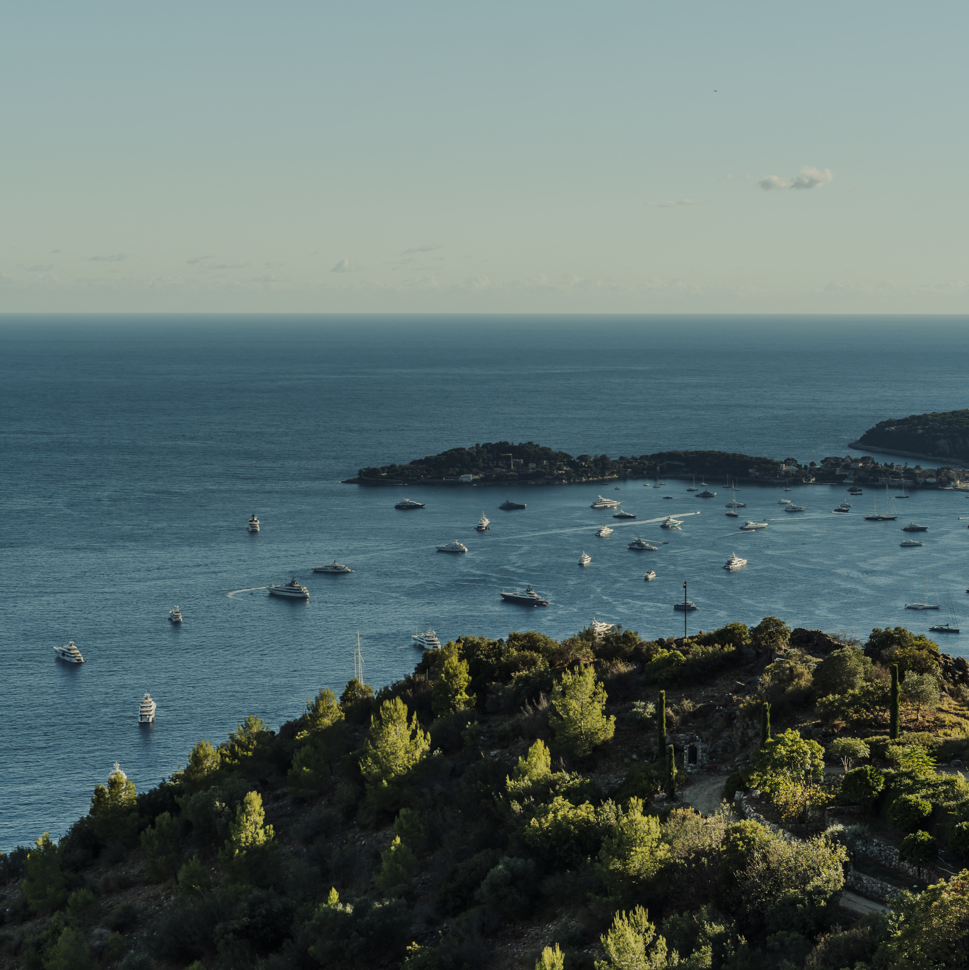Yachts scattered along the coast outside Monaco&#039;s Port Hercule