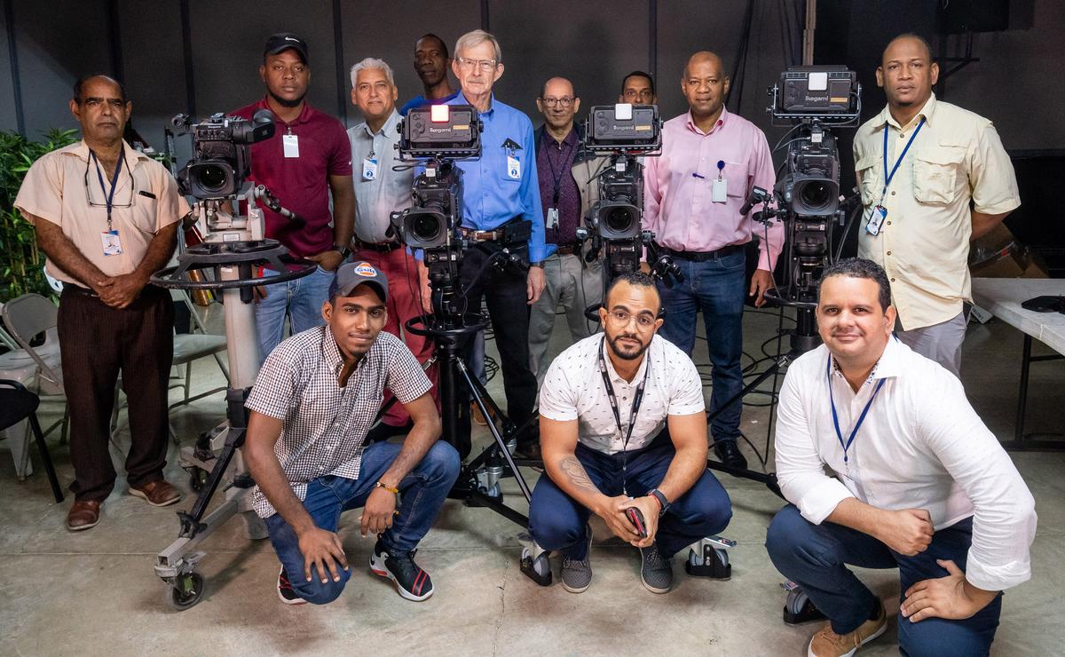 Luis Aquino (standing 2nd from right) and CERTV colleagues with Ikegami&#039;s Alan Keil (mid-blue shirt) and Oscar Vaca (light blue shirt) plus the four new UHK-X700 cameras.