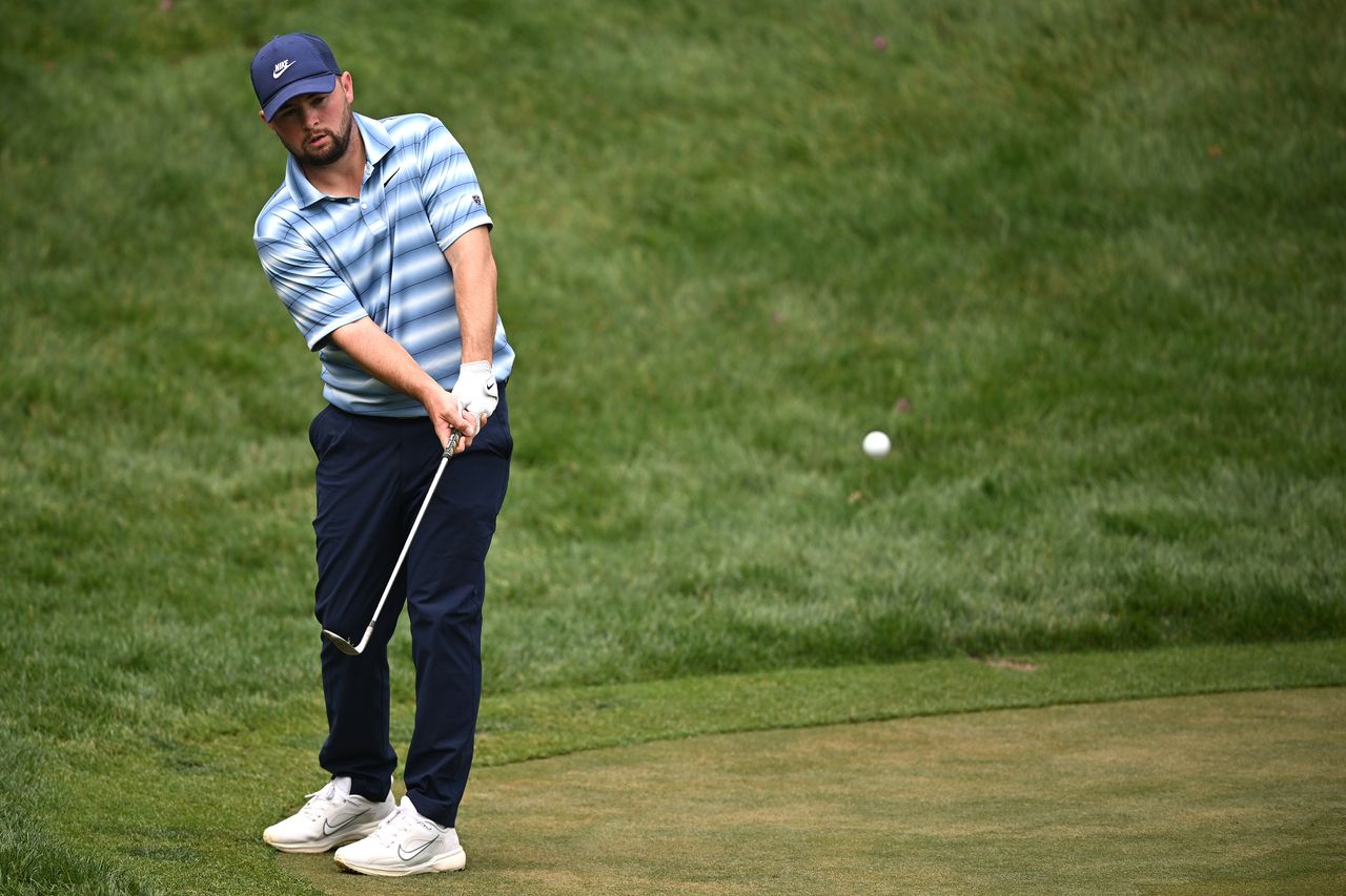 Alex Fitzpatrick hits his third shot on the 7th hole on day four of the Hero Indian Open