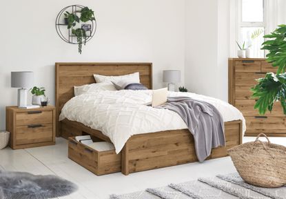 wooden bed with storage by next