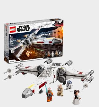 Lego X-Wing on a plain background