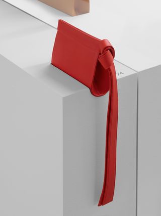 Red leather handbag, part of exhibition