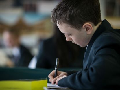 A pupil writing