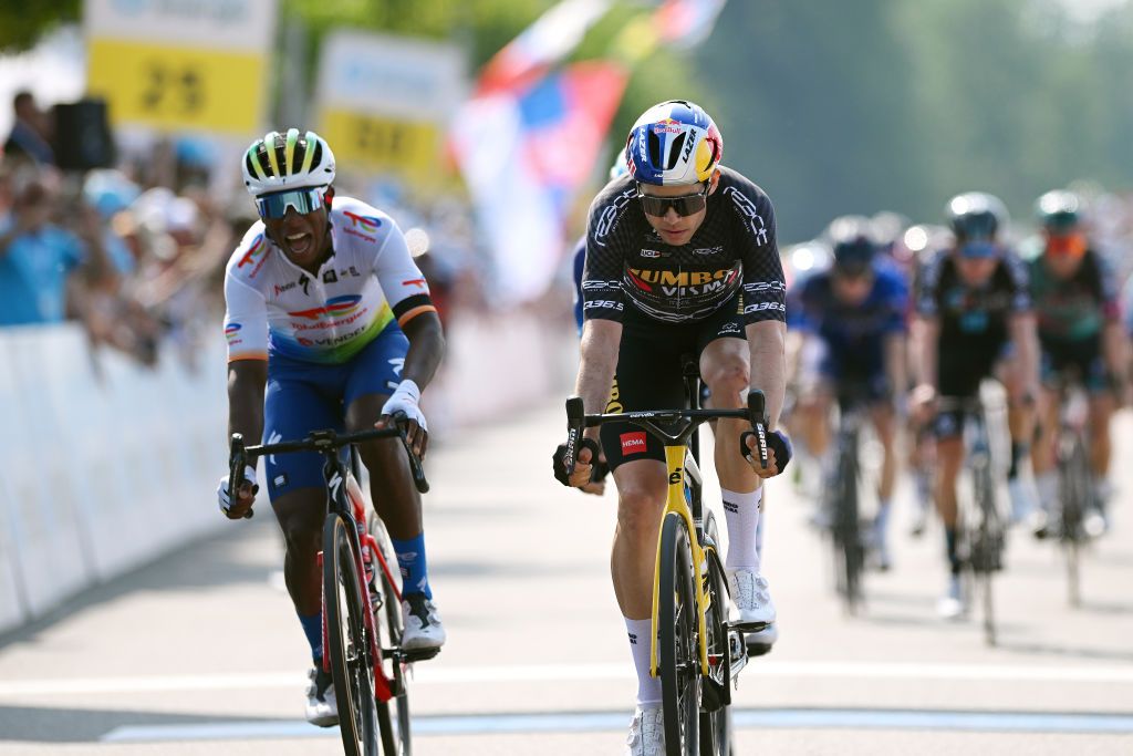 WEINFELDEN SWITZERLAND JUNE 17 LR Lorrenzo Manzin of France and Team TotalEnergies and Wout Van Aert of Belgium and Team JumboVisma Black Points Jersey sprint at finish line during the 86th Tour de Suisse 2023 Stage 7 a 1835km stage from Tbach to Weinfelden UCIWT on June 17 2023 in Weinfelden Switzerland Photo by Dario BelingheriGetty Images