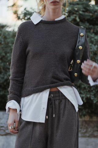 model wearing zara fine knit sweater